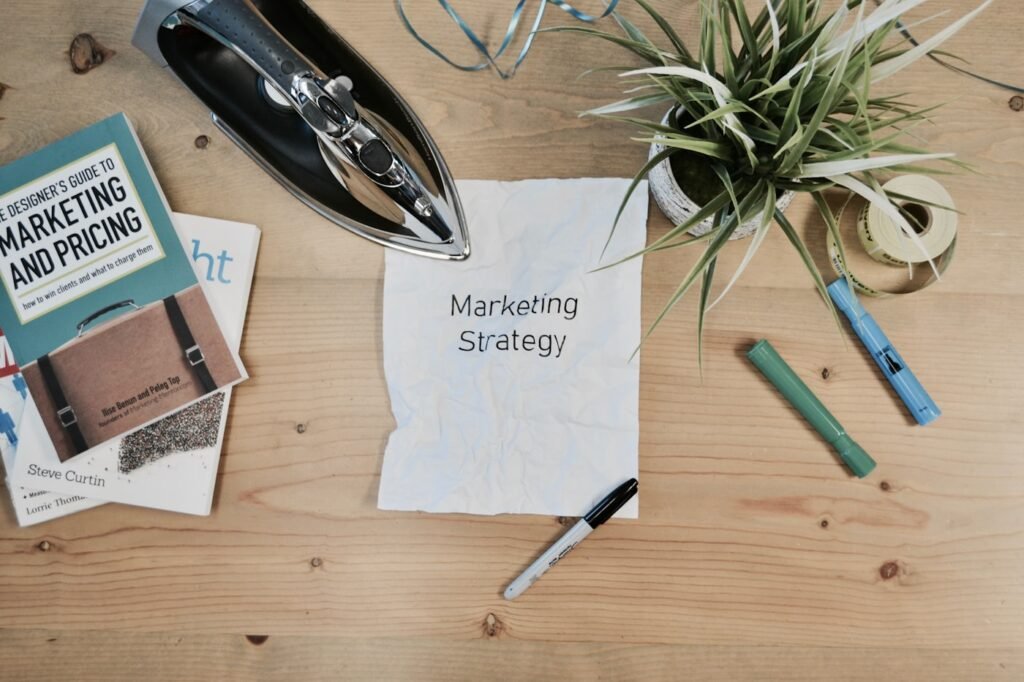 Marketing analytics laptop tracking fitness studio ad spend and conversions